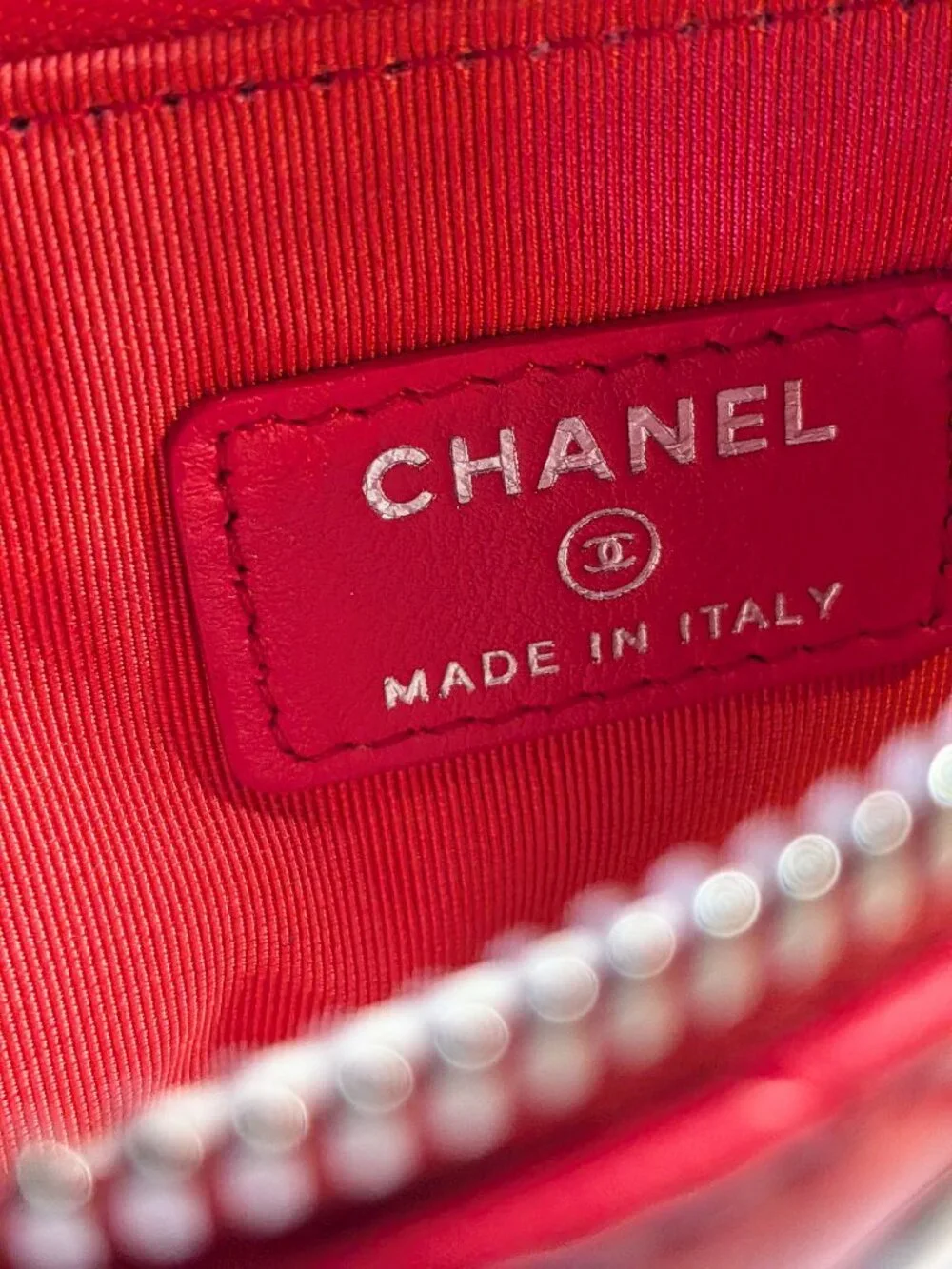 CHANEL Mini O-Case Zip Pouch — Red Chevron Quilted Lambskin, Studded Trim